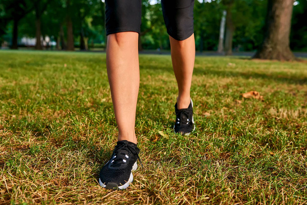 The legs of a running woman - Фото, изображение
