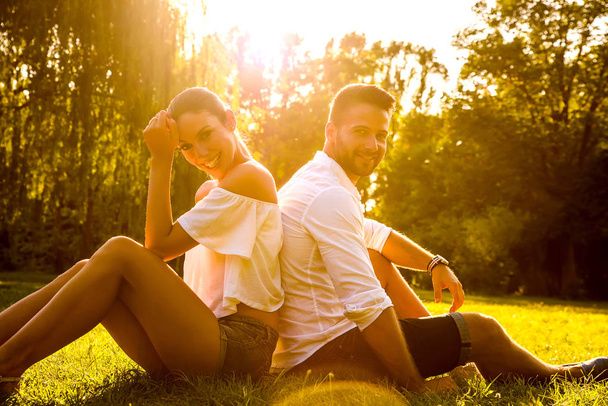 Nice young couple in the park	 - Foto, Imagen