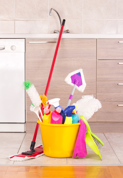 Cleaning products in bucket in kitchen - Photo, Image