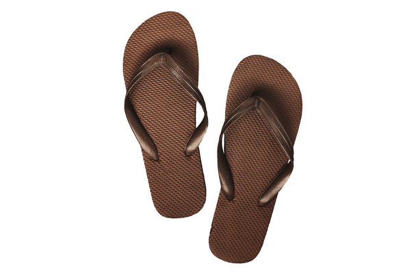 Bruine rubberen slippers, geïsoleerd op een witte achtergrond - Foto, afbeelding