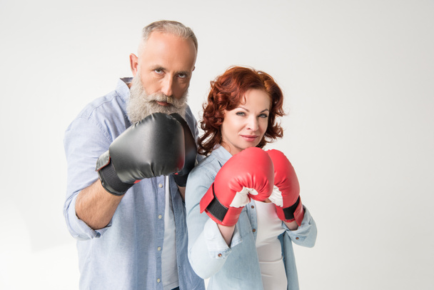 mature couple in boxing gloves - Fotó, kép
