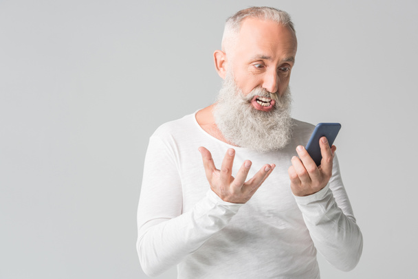 Homme âgé avec smartphone
 - Photo, image
