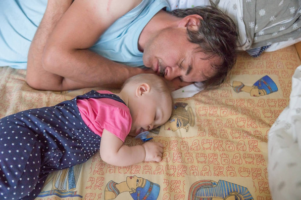 Dad and baby sleeping. - Photo, Image