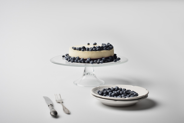 cheesecake with blueberries on glass stand - Foto, Imagen