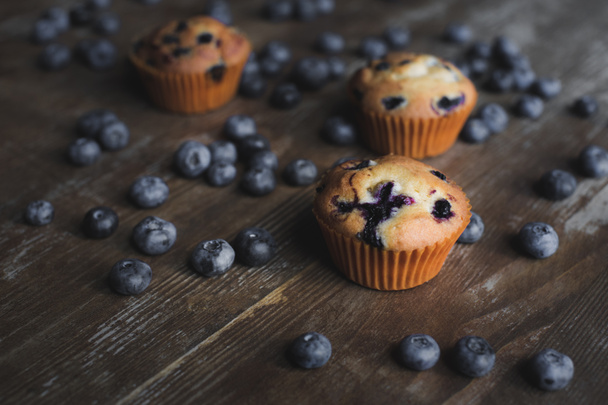 delicious cupcakes with blueberries - Photo, image
