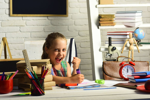 Childhood and back to school concept. Kid with colorful stationery - Foto, imagen