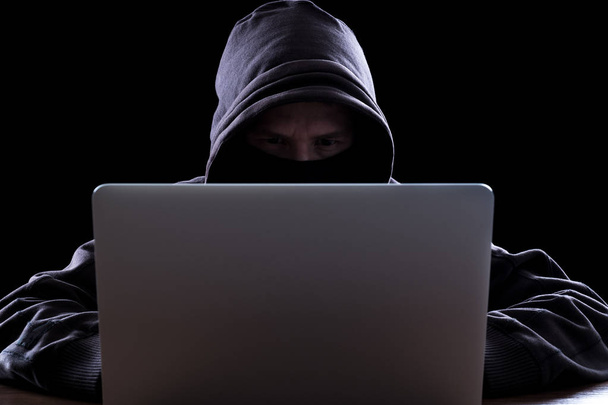 Anonymous hacker in the dark - Fotografie, Obrázek