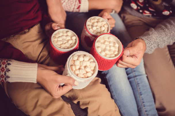 family with cups of cacao and marshmallow - Photo, Image
