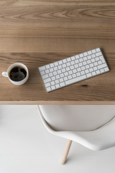 wireless keyboard and cup of coffee - Photo, Image