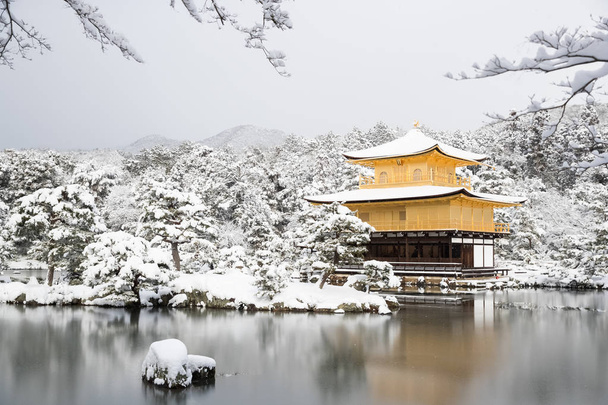 Golden Pavilion with snow fall  - Photo, Image