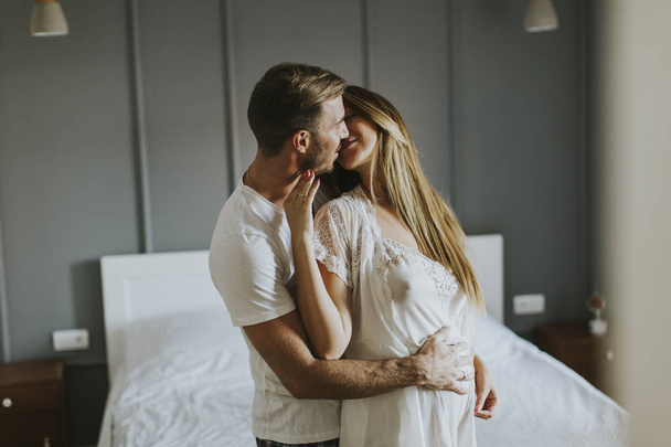 Loving couple huging in the room - Photo, Image