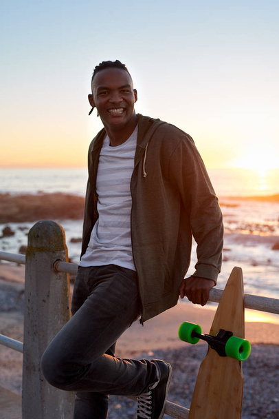 african man with longboard - Photo, image
