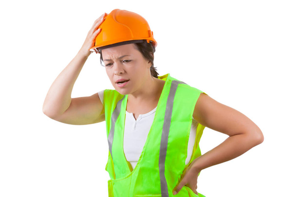 安全ジャケットと黄色いヘルメット干ばつの魅力的な女性労働者 - 写真・画像
