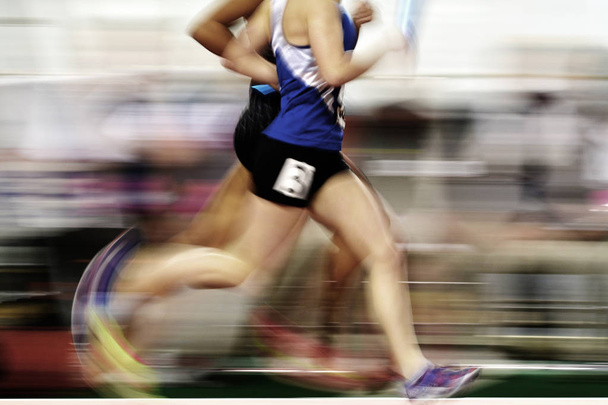 Juoksija Race on Track kanssa Baton Relay Team Pisteet
 - Valokuva, kuva