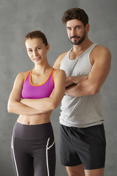 Athletic couple in the gym  - Fotó, kép