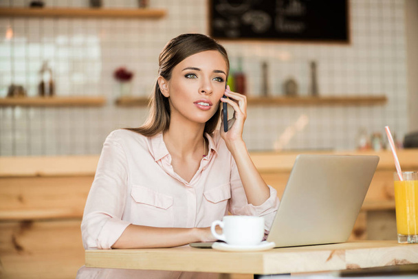 businesswoman working in cafe - Photo, Image