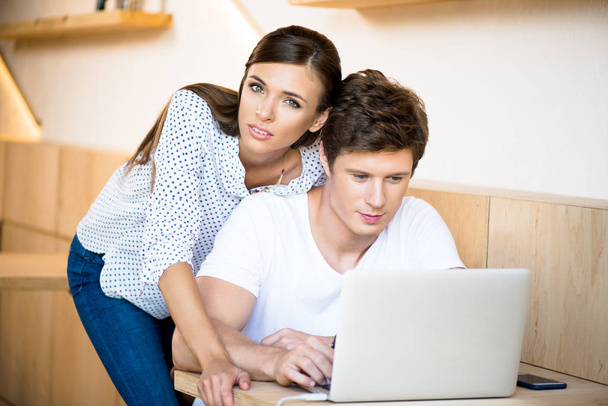 couple using laptop - Fotó, kép