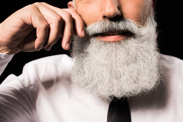 hombre retorciendo bigote
 - Foto, Imagen