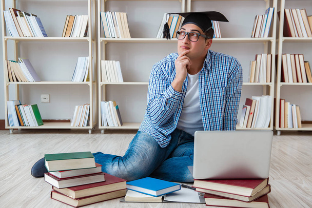 Young student studying with books - Photo, Image