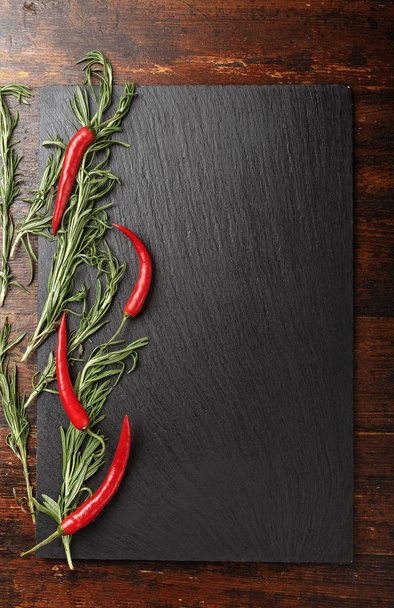 hot peppers and rosemary - Foto, Bild