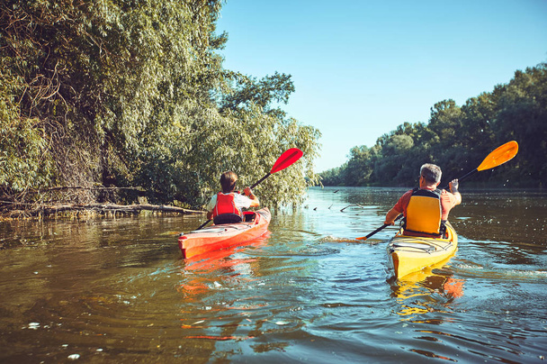 A canoe trip on the river in the summer. - Fotoğraf, Görsel