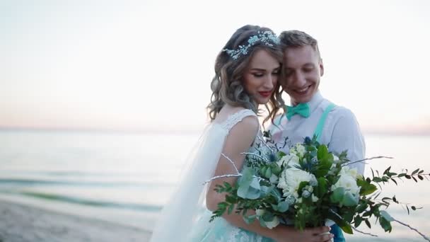 Bride and groom near the sea - Footage, Video