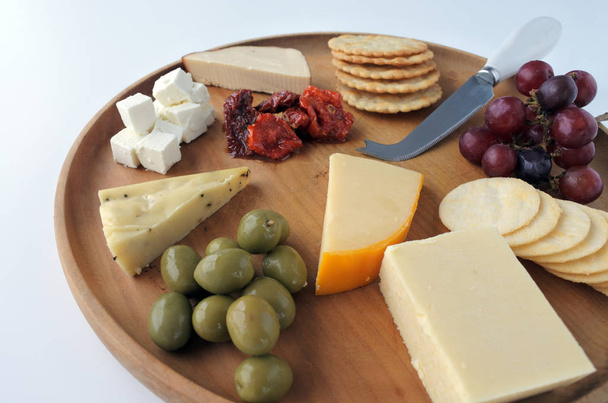 Cheese platter with red wine - Photo, Image
