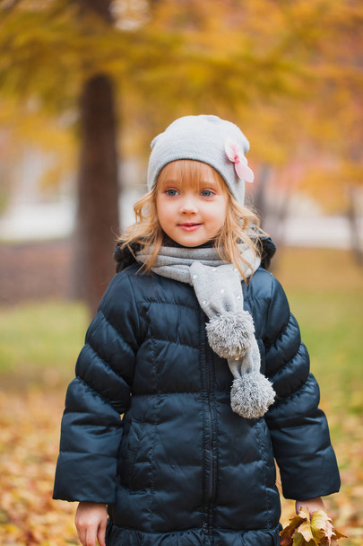 Autumn portrait of cute little caucasian girl - Фото, зображення