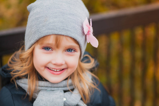 Autumn portrait of cute little caucasian girl - Фото, зображення