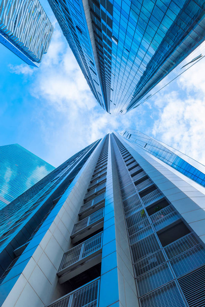 Skycrapers and business ceter at low angle view - Photo, Image