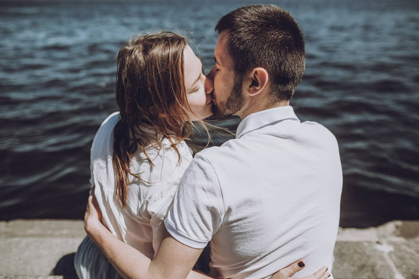 couple kissing on sea background - Fotografie, Obrázek