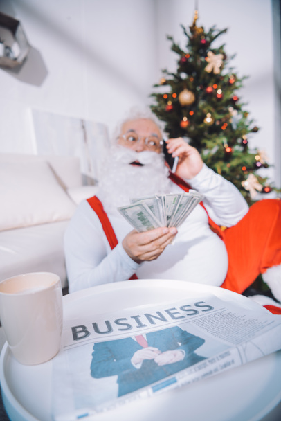 santa claus with cash in hand - Photo, image