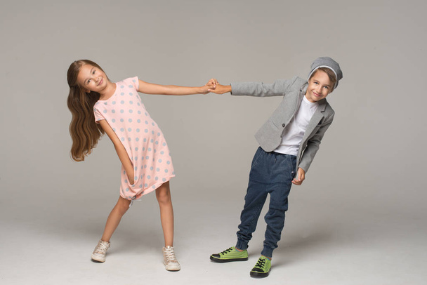 Cute boy and girl dancing - Zdjęcie, obraz