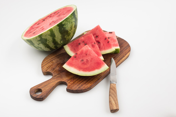 watermelon on cutting board - 写真・画像
