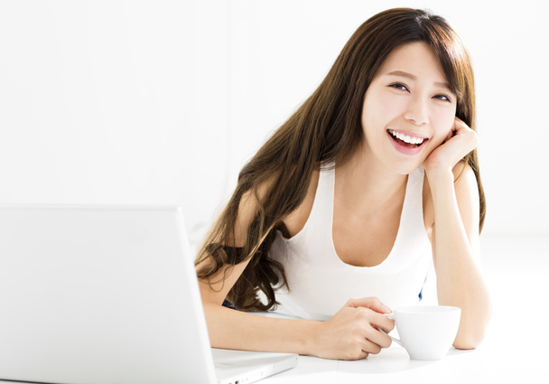 Happy Young Beautiful Woman Using Laptop - Photo, Image