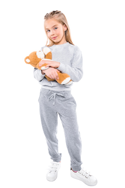 child carrying teddy bear - Фото, зображення