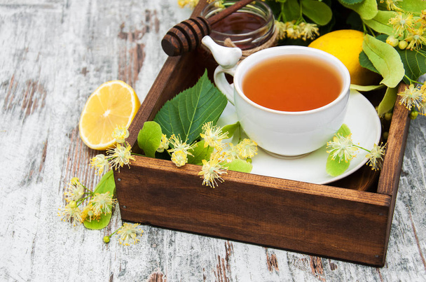 cup of herbal tea with linden flowers - Photo, Image