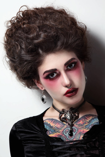 woman with vintage hairdo and gothic makeup - Foto, Imagem