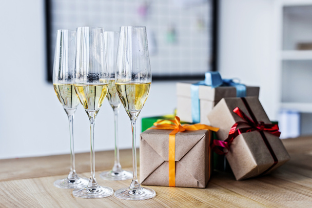 champagne glasses and gift boxes - Фото, изображение