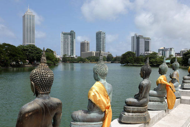 The skyline of Colombo with Buddha statues - Photo, Image