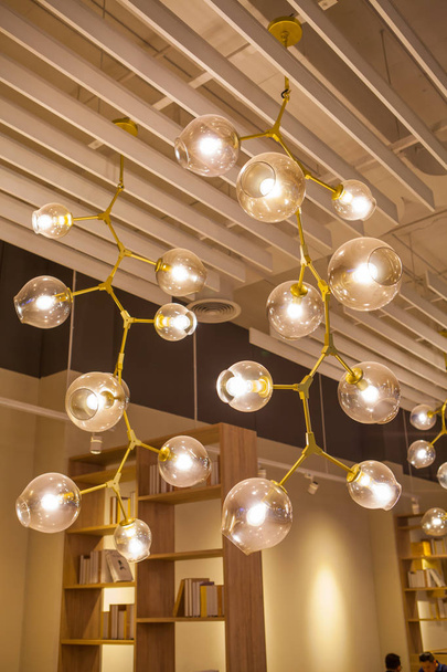 Beautiful chandelier. luxury expensive chandelier hanging under  - Fotografie, Obrázek