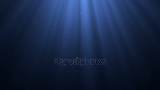 High quality Looping animation of ocean waves from underwater with floating plankton. Light rays shining through. Great popular marine Background. (seamless loop, HD, high definition 1080p) - Footage, Video