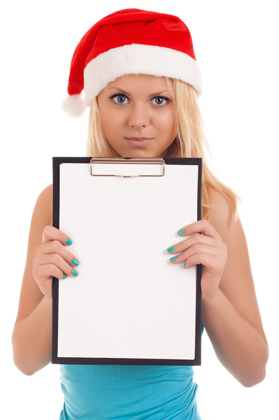 Young woman in santa hat holding blank board - Foto, Imagen