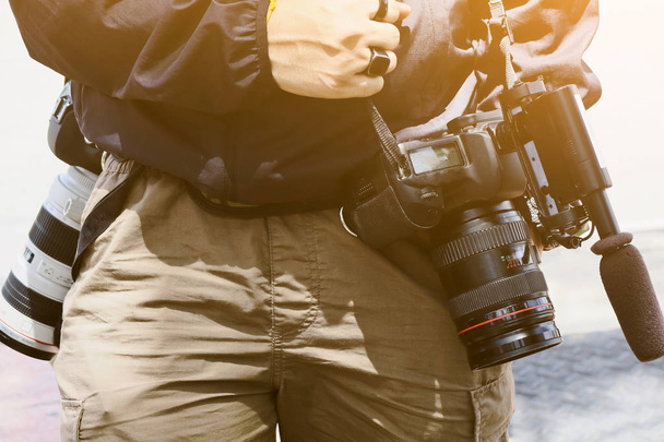 Cameraman avec son appareil photo
 - Photo, image