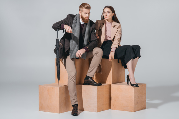 stylish couple on wooden blocks - Foto, Imagen