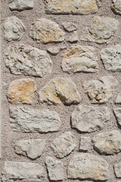 Τοίχο φτιαγμένο από το ίδιο είδος από πέτρες - Φωτογραφία, εικόνα