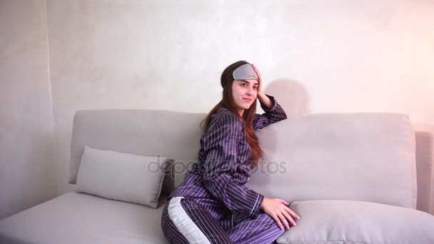 Awakening of woman after dream in good mood in bedroom on couch good morning. - Footage, Video