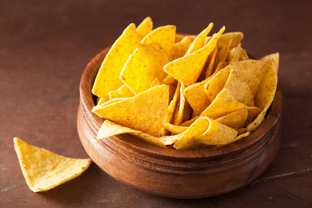 mexican nacho chips on brown background - Photo, Image