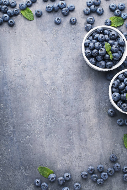 Ripe blueberries in bowls  - Fotografie, Obrázek