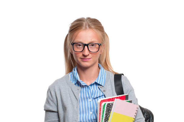 Young student girl holding books.  Back to school - Photo, Image